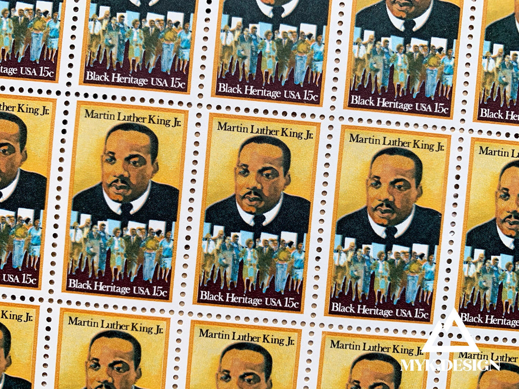 Close-up of the 1979 Martin Luther King Jr. 15¢ U.S. postage stamp (Scott 1771), part of the Black Heritage series, featuring King’s portrait and marchers behind him.