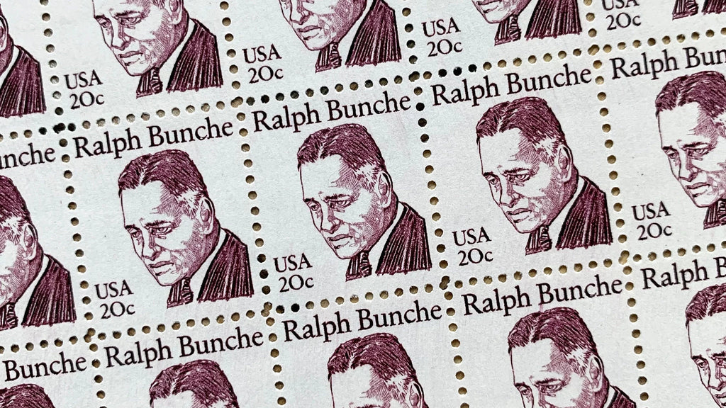 Close-up of the 1982 Ralph Bunche U.S. postage stamp (Scott 1860), 20 cents, featuring a violet engraved portrait of the Nobel Peace Prize-winning diplomat and peacemaker.